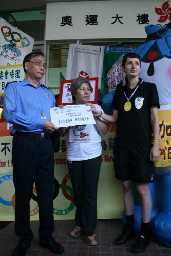 Play Fair activists presented the campaign&#39;s demands and the &quot;Road Map for Action&quot; to an IOC representative in Hong Kong, August 3, 2008.