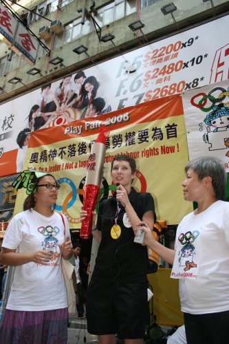 HK Play Fair 2008 organizers passed a symbolic Olympic torch over to the PF representative for the next PF campaign.